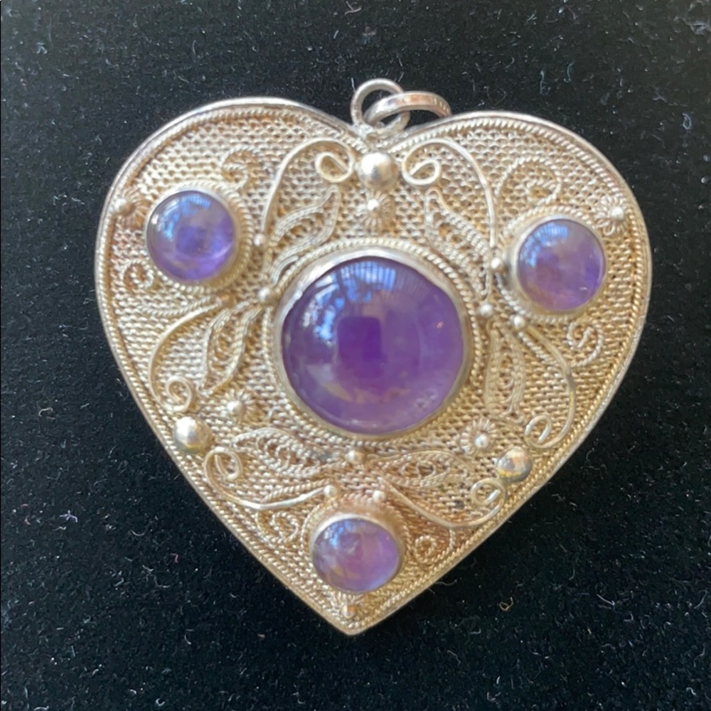 Antique sterling silver with amethyst brooch